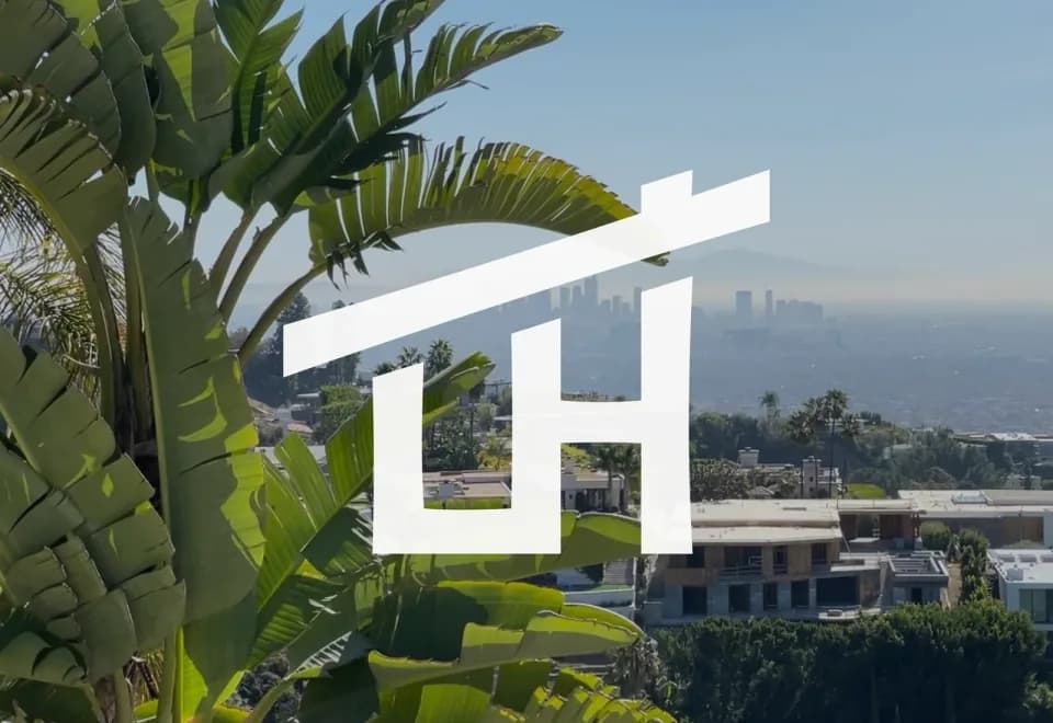 Launch House identity with house monogram, yellow accents, apparel and onboarding guide